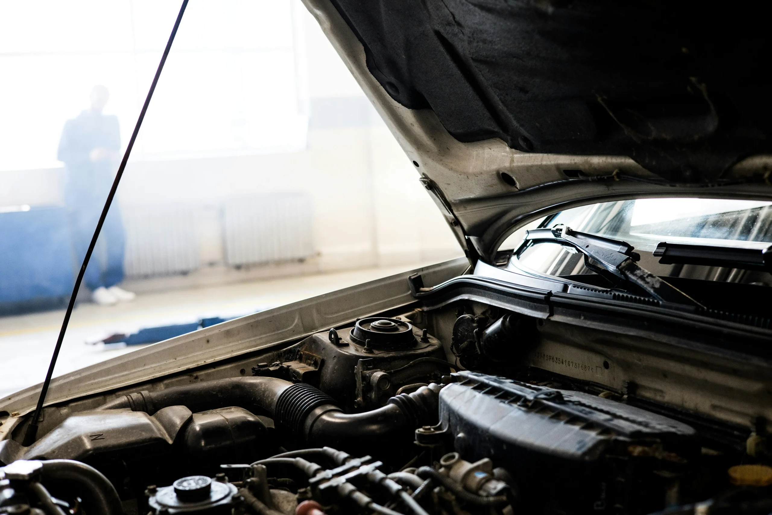 Car with the hood open