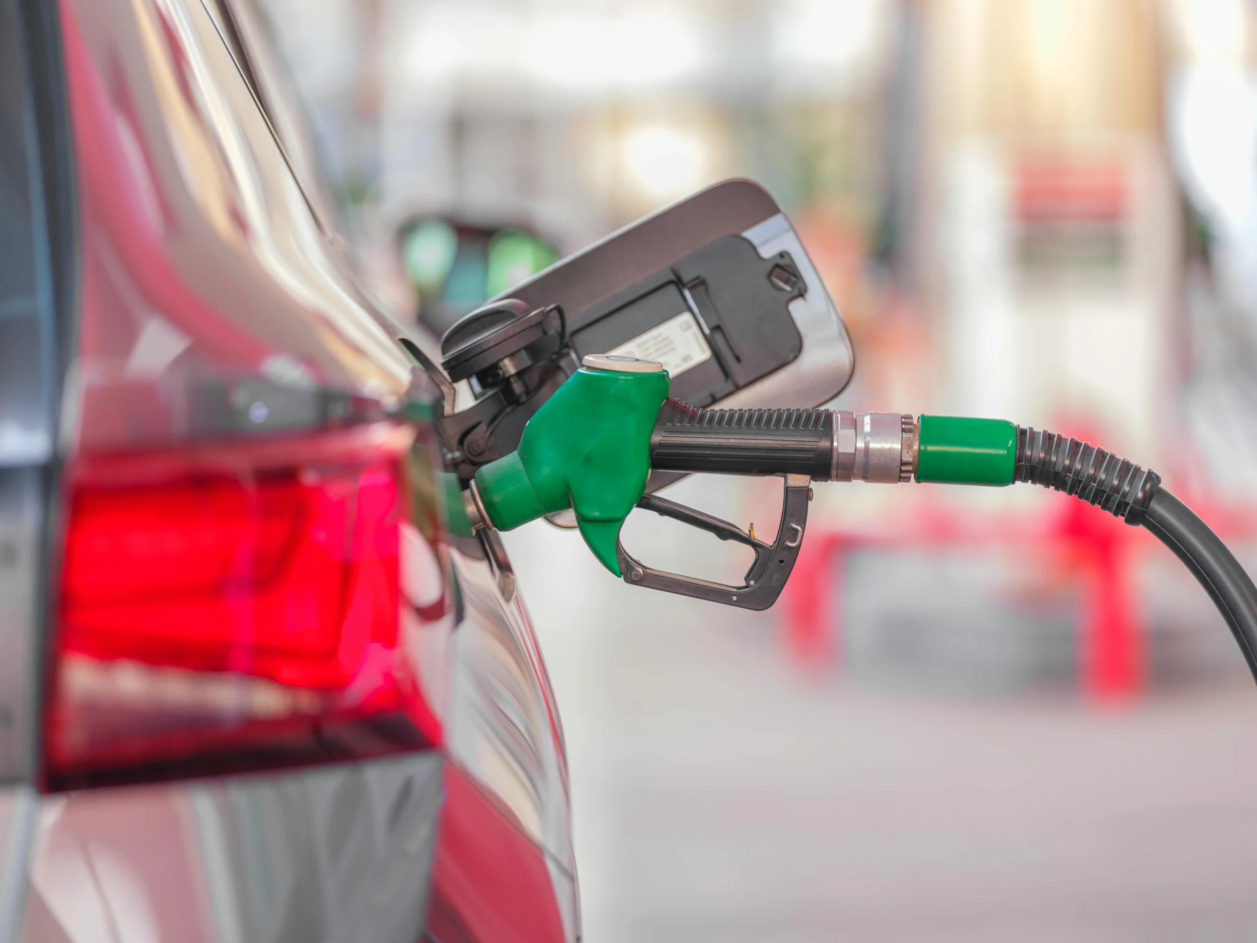 a car being filled up with fuel
