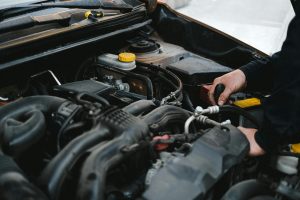 A mechanic diagnosing the car engine