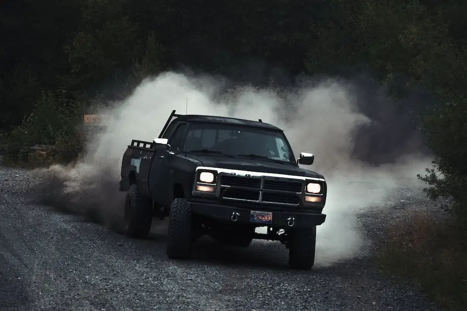 A close-up image of the Chevy Silverado emblem on the front grille of a truck.